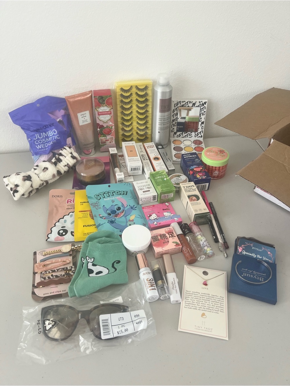 Box 7. Assorted Beauty & Accessories Bundle with Green Cat socks.